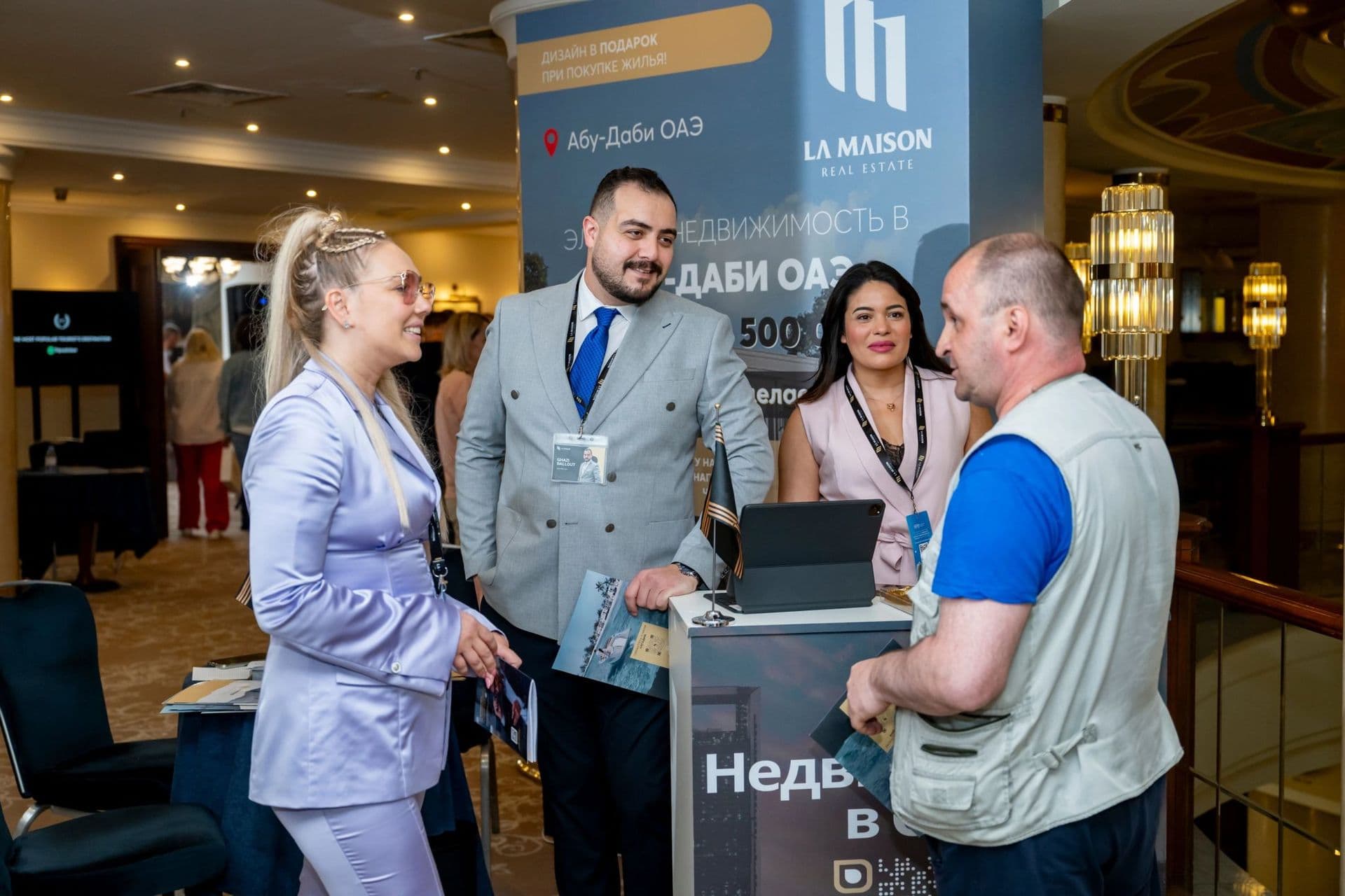 The La Maison team meeting buyers at a property exhibition, photograph 3
